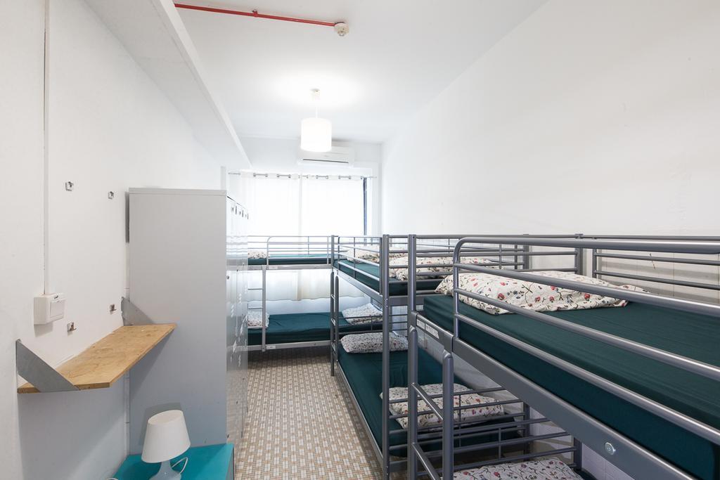 New Society Backpackers Hostel Singapur Habitación foto